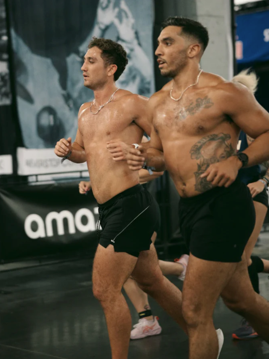 Two strong determined people running with confidence, symbolising the connection between physical fitness and mental resilience