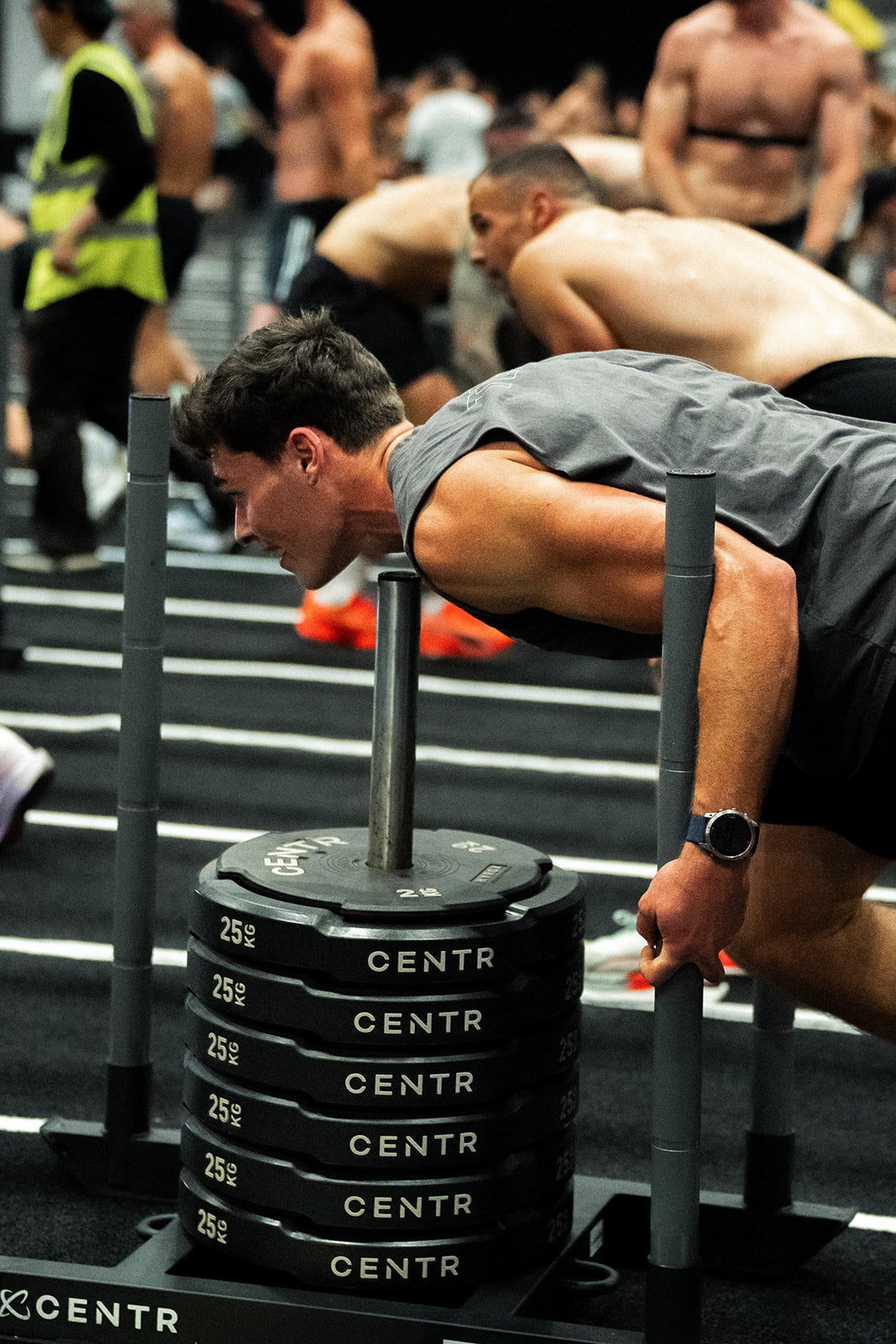Xendurance athlete pushing a sled at Hyrox