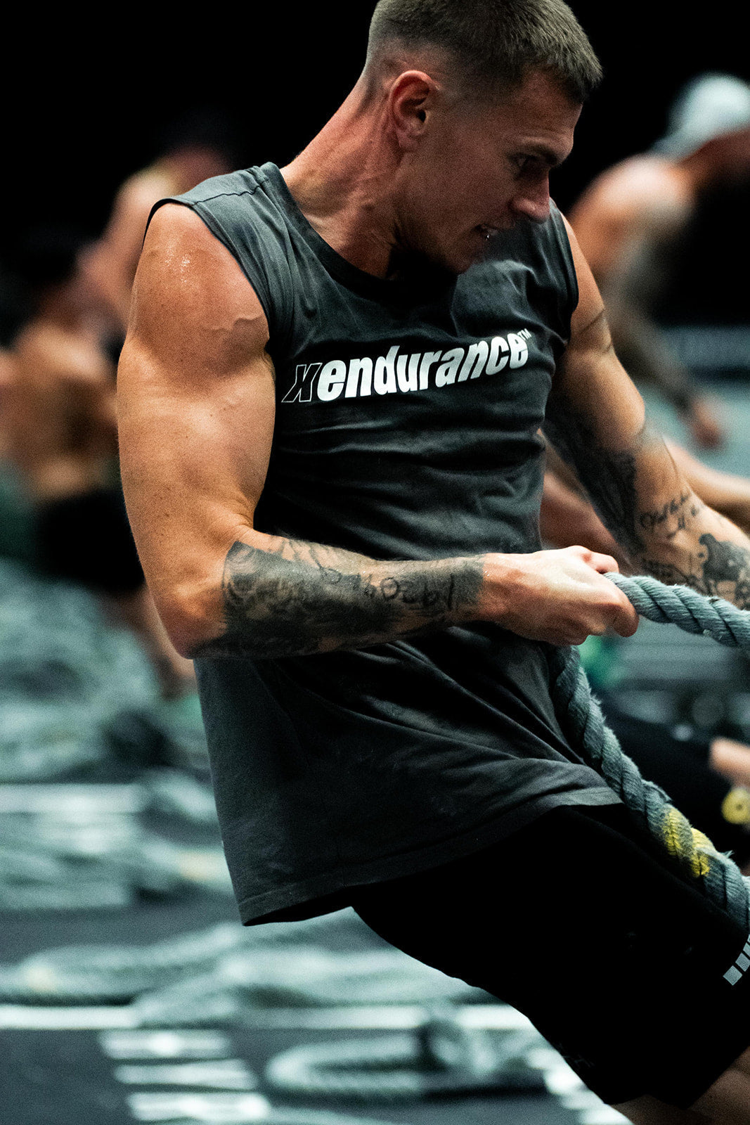 Xendurance athlete pulling a heavy sled